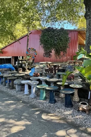 Decorative stone bird baths and garden statuary display at Soviero's Garden Center