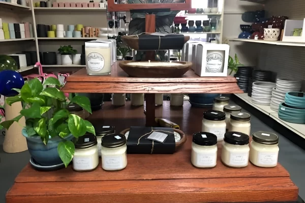 Handcrafted candles including Twisted Cork brand displayed at Soviero's Garden Center in High Point NC