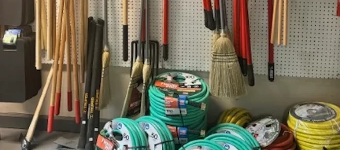 Lawn care, garden tools, and hose accessories at Soviero's Garden Center in High Point, NC.